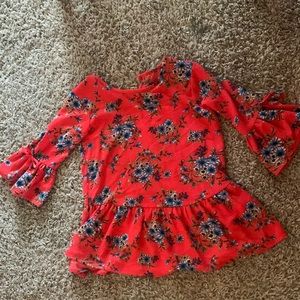 Red shirt with flowers